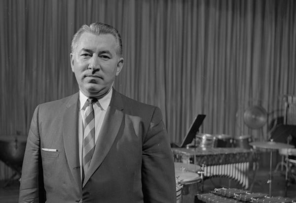 man in room with percussion instruments