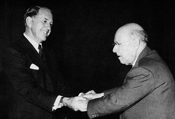 two men shaking hands